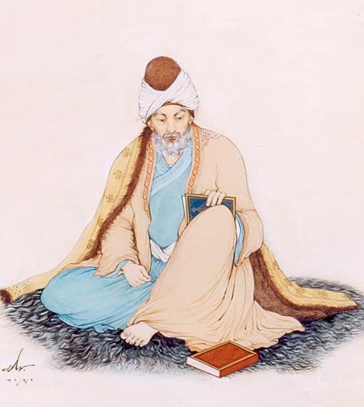 A picture depicting 13th century Sufi poet, Jalal Rumi. A pale, rose background. Rumi is in traditional Persian dress, flowing beige and blue garments and head covering is white and red. He's sitting with one knee up, one knee on a gray and white rug. Rumi is holding a blue book, with a red book at his feet.