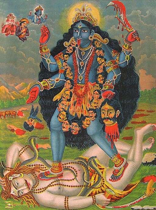 The goddess Kali stepping on Lord Shive. Kali is blue, with a necklace of skulls and on a destruction path. Shive calms her down by lying prostrate and taking in her pain.